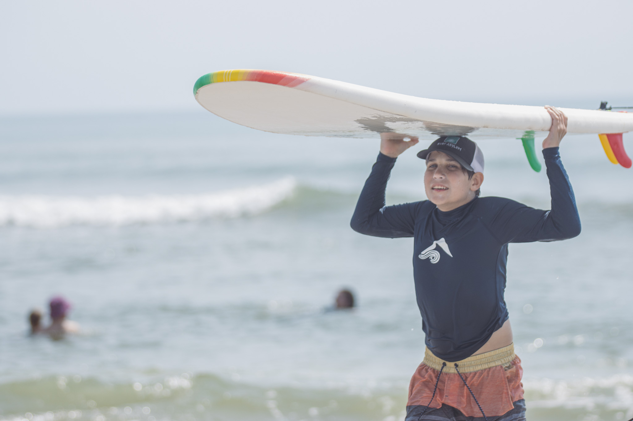 Local youth take part in the Surf Asylum clinic Monday morning on Amelia Island. Photo by Ashley Chandler/News-Leader