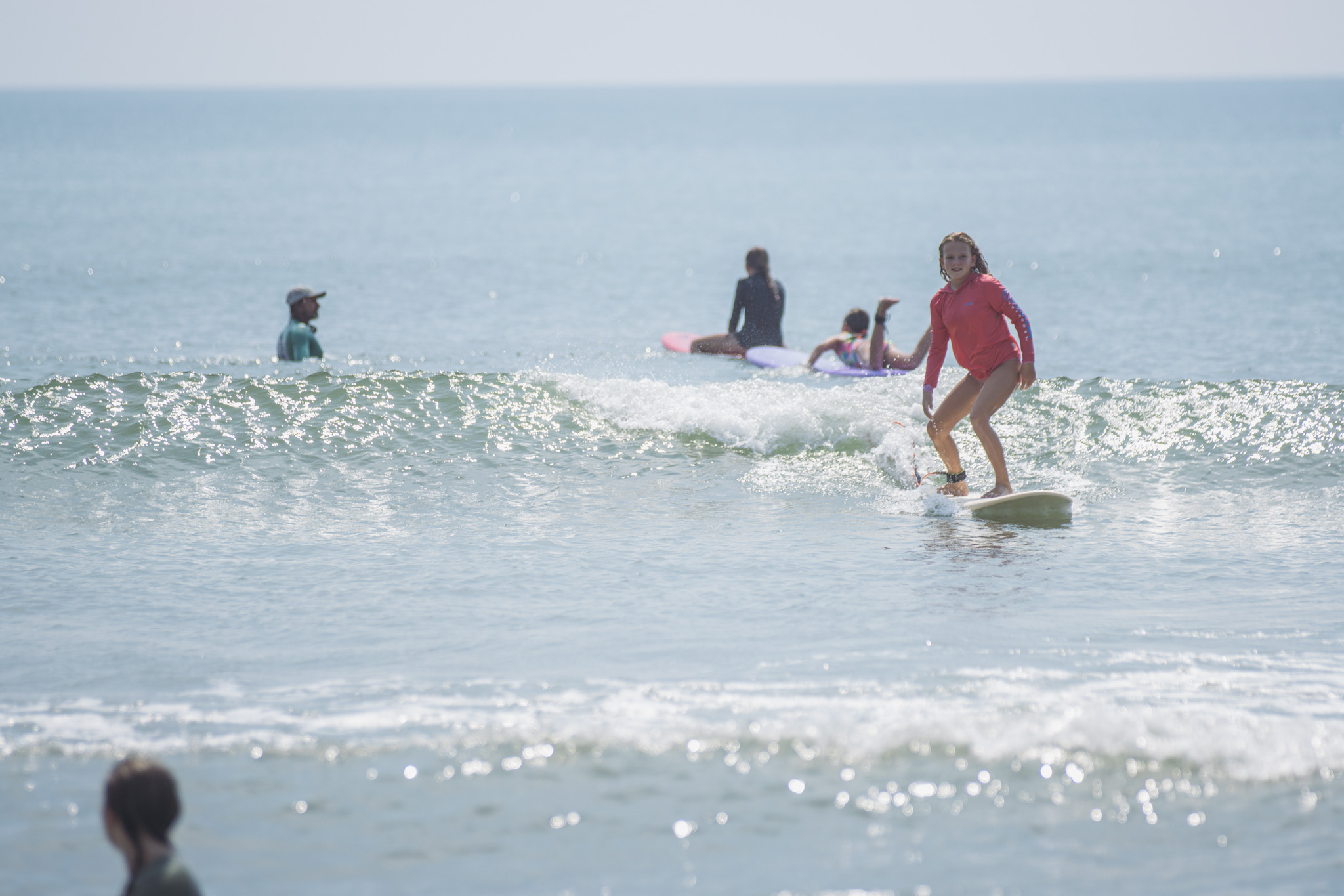 Local youth take part in the Surf Asylum clinic Monday morning on Amelia Island. Photo by Ashley Chandler/News-Leader