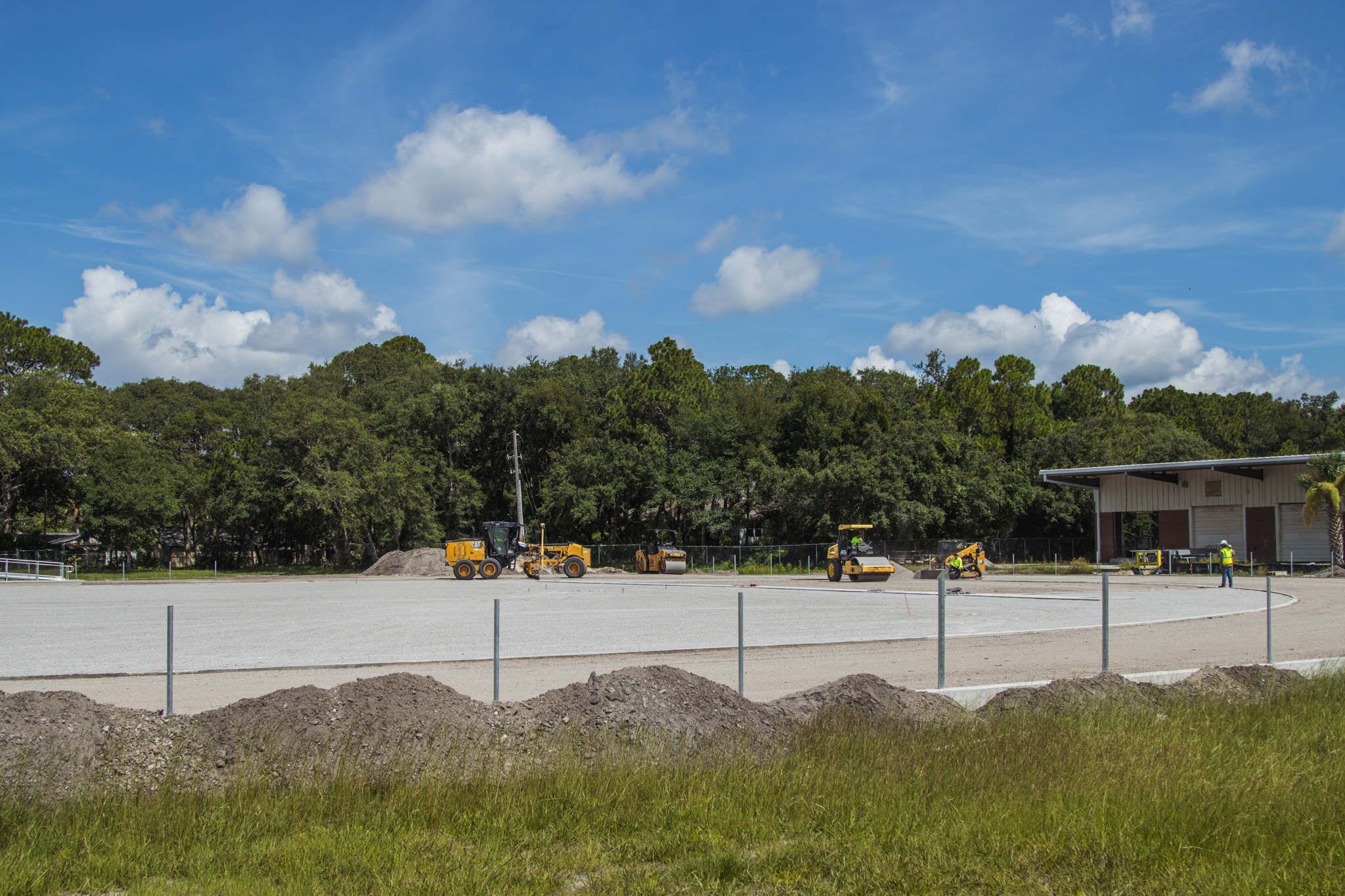 Construction of the Fernandina Beach High School stadium is nearing completion. Work continued Tuesday on the track, field and concession stand. Photo by Ashley Chandler/News-Leader