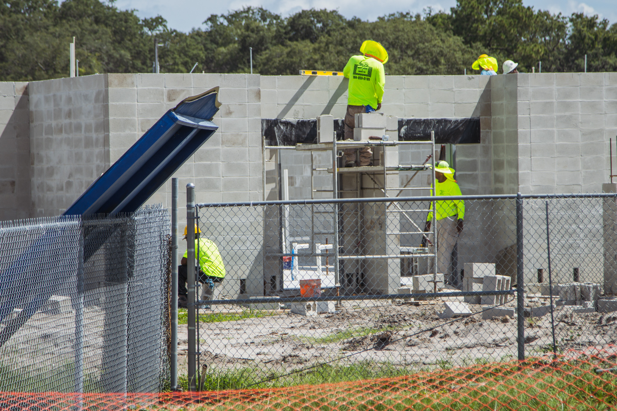 Construction of the Fernandina Beach High School stadium is nearing completion. Work continued Tuesday on the track, field and concession stand. Photo by Ashley Chandler/News-Leader
