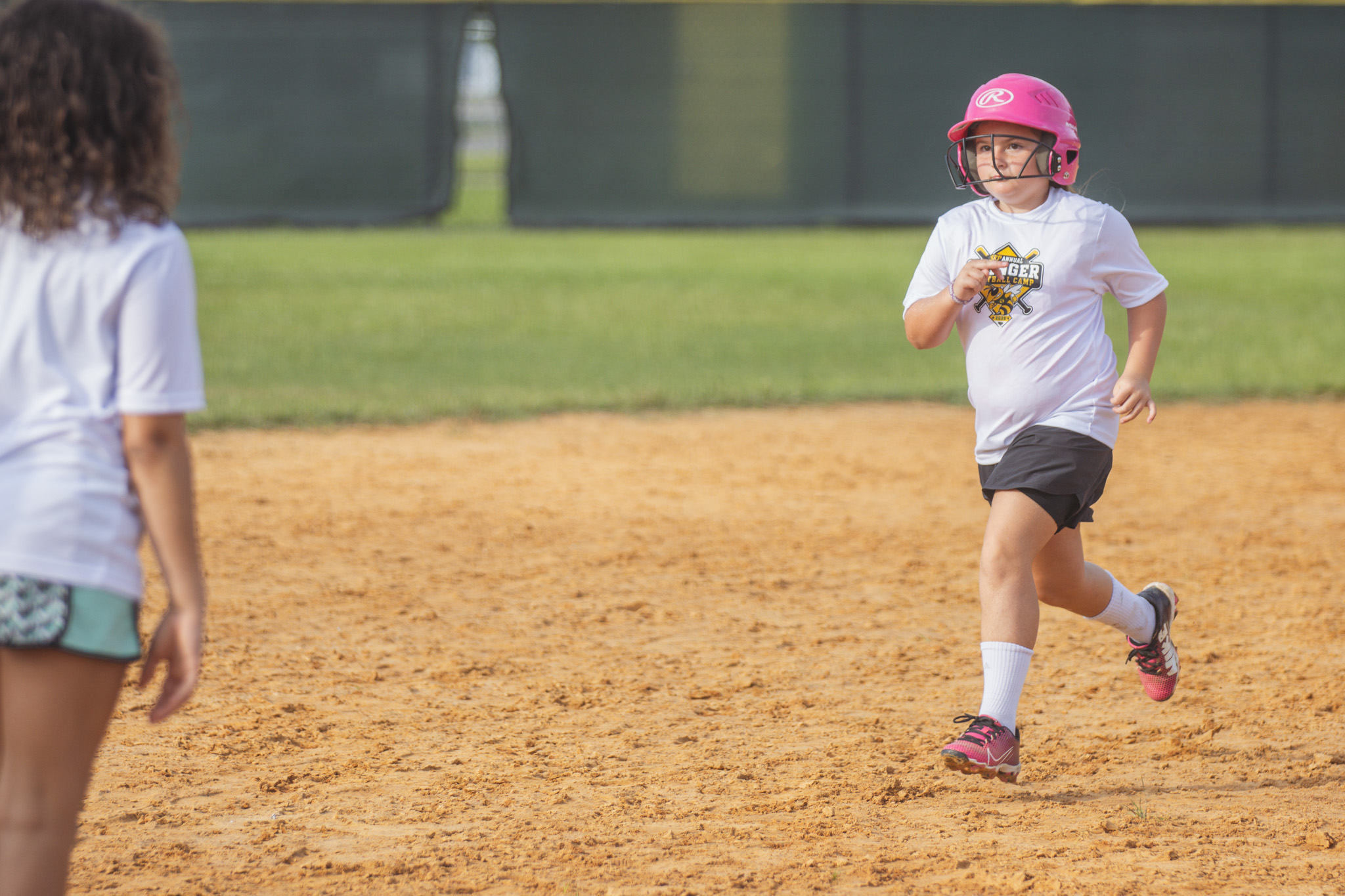 Softball players between the ages of six and 14 participated in the Yulee High School Softball Camp this week at the Yulee Sports Complex. Photo by Ashley Chandler/News-Leader