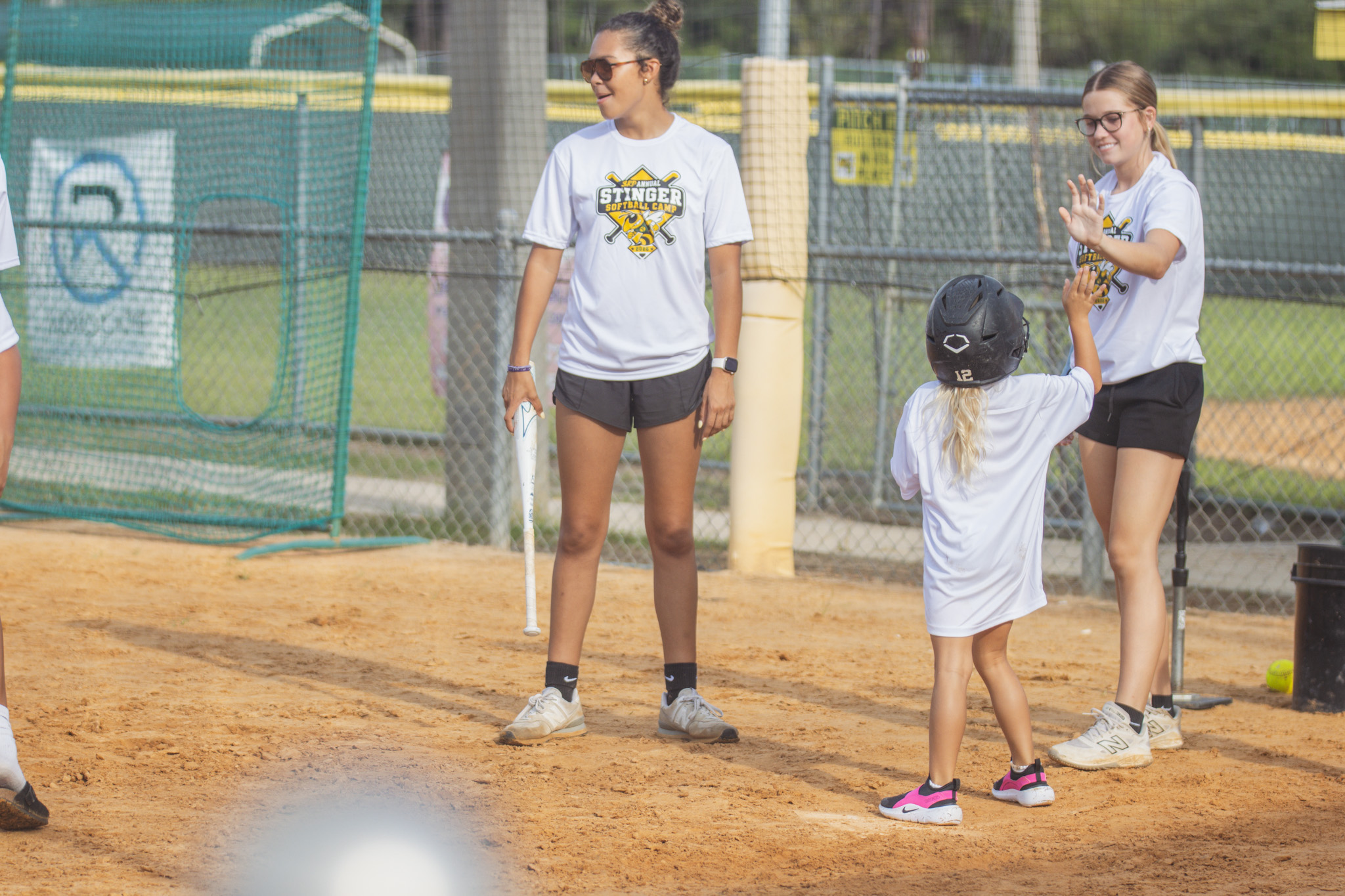Softball players between the ages of six and 14 participated in the Yulee High School Softball Camp this week at the Yulee Sports Complex. Photo by Ashley Chandler/News-Leader