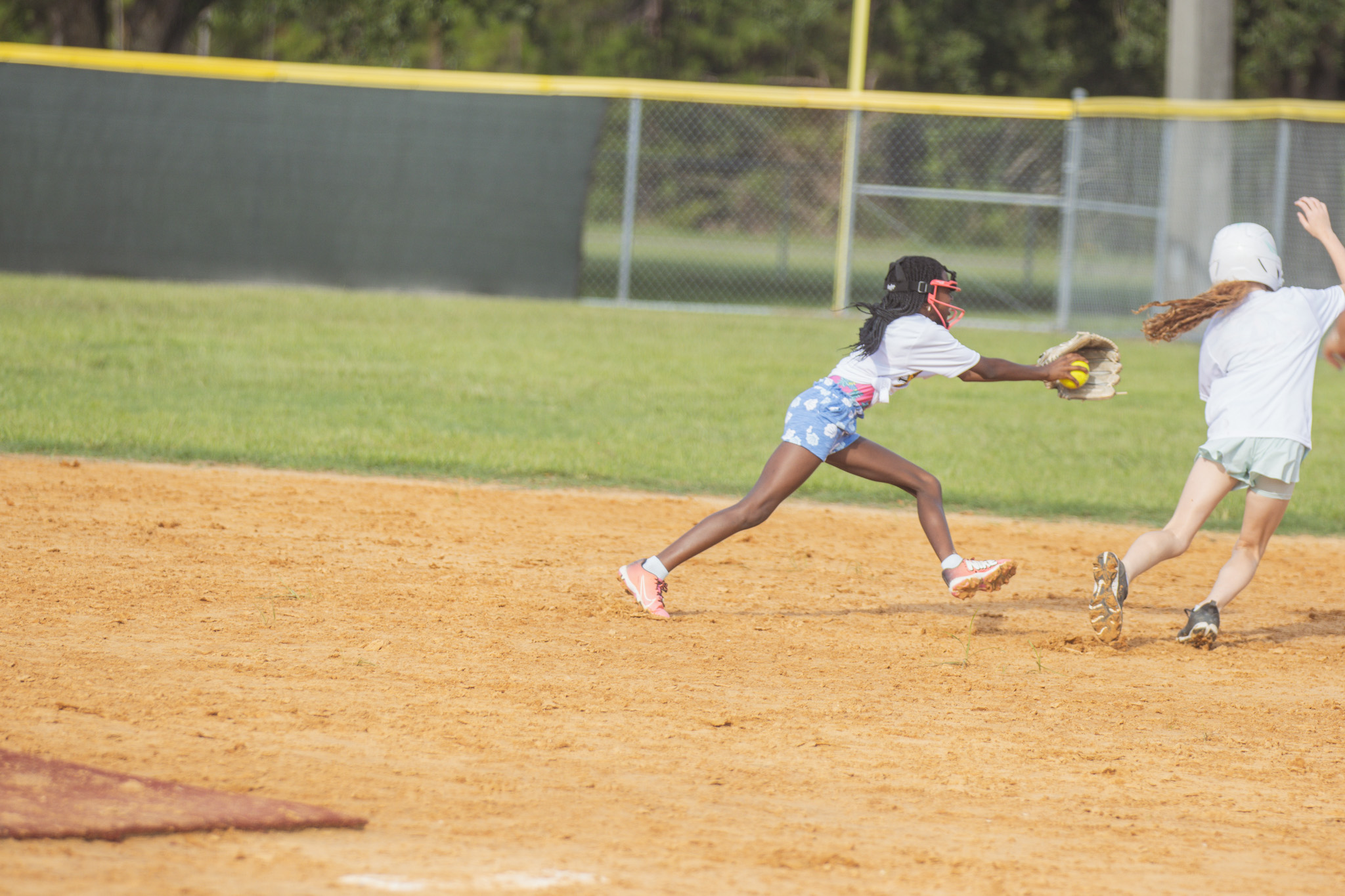 Softball players between the ages of six and 14 participated in the Yulee High School Softball Camp this week at the Yulee Sports Complex. Photo by Ashley Chandler/News-Leader
