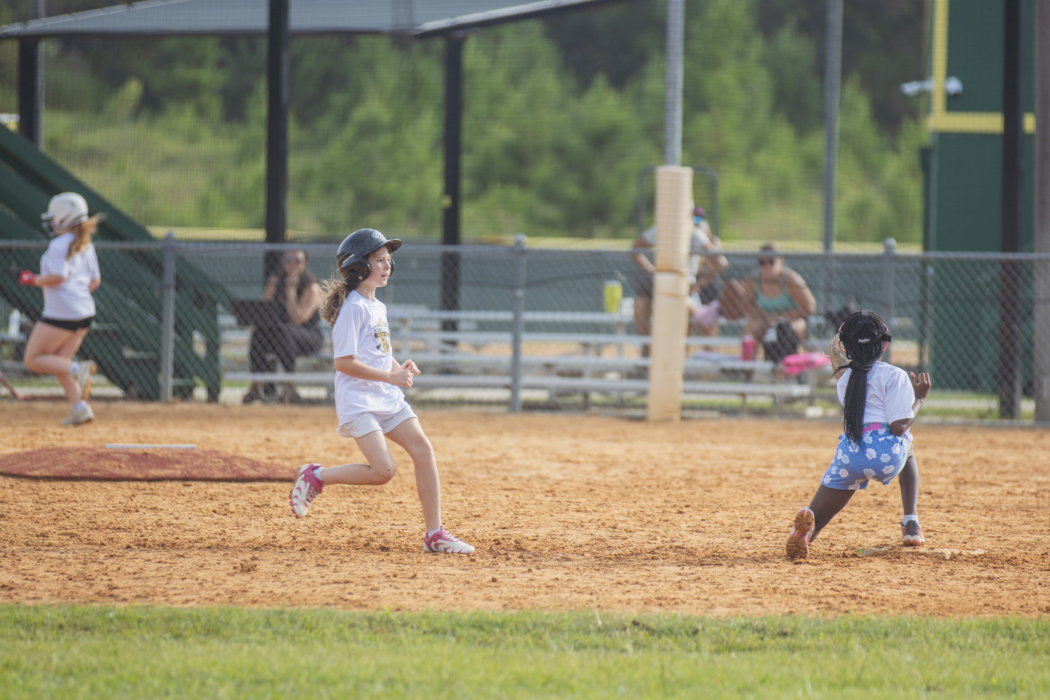 Softball players between the ages of six and 14 participated in the Yulee High School Softball Camp this week at the Yulee Sports Complex. Photo by Ashley Chandler/News-Leader