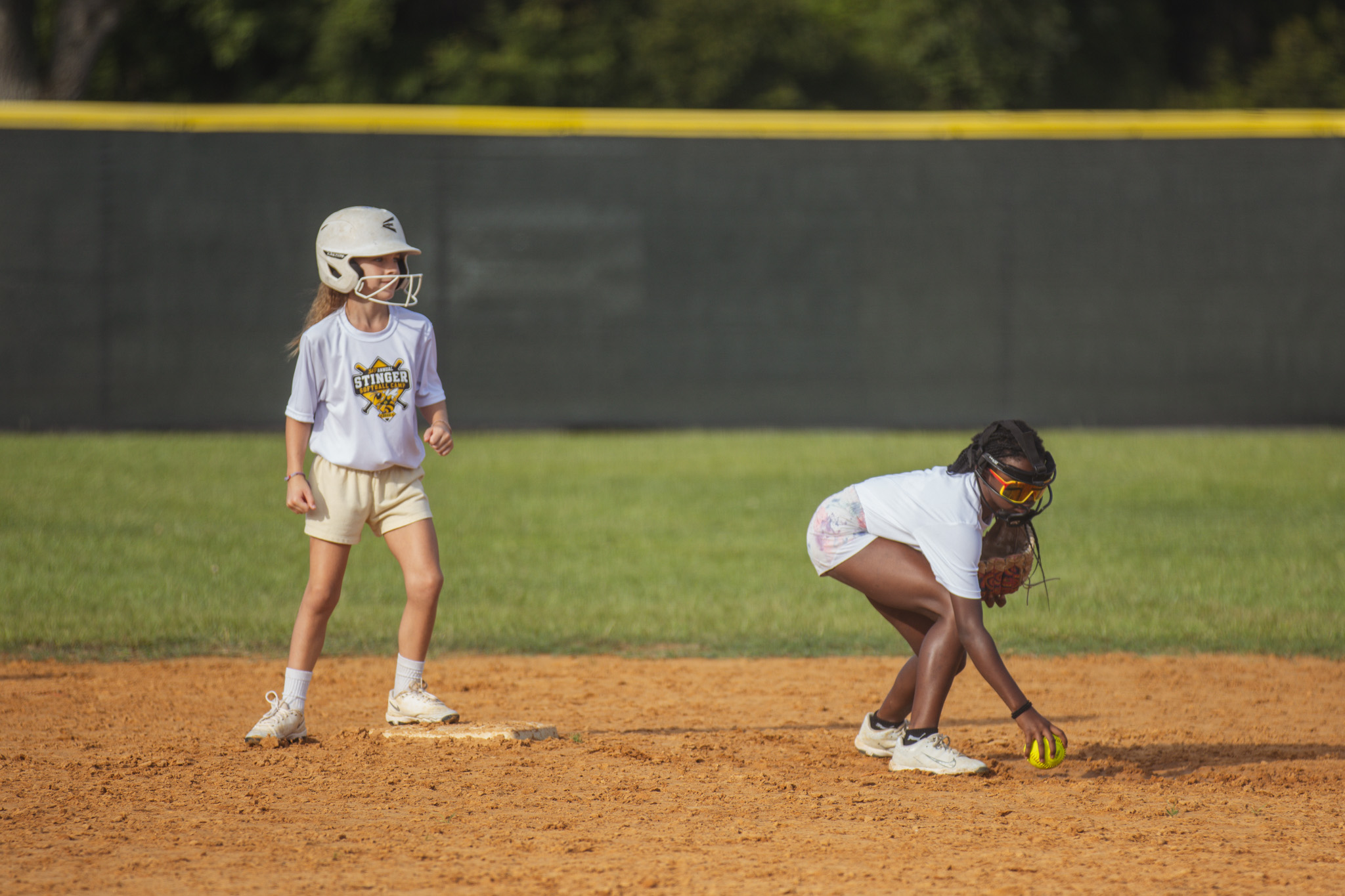 Softball players between the ages of six and 14 participated in the Yulee High School Softball Camp this week at the Yulee Sports Complex. Photo by Ashley Chandler/News-Leader