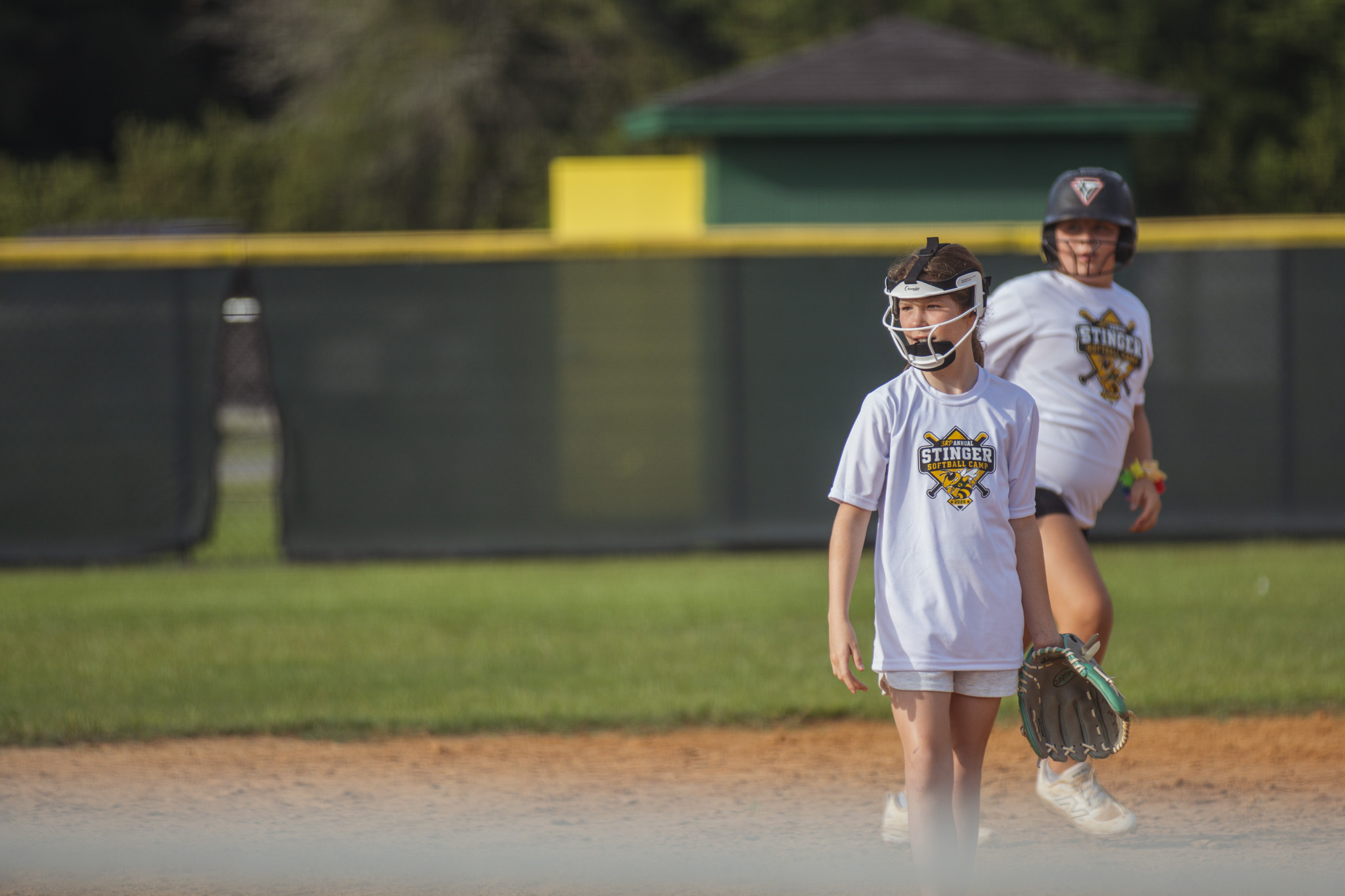 Softball players between the ages of six and 14 participated in the Yulee High School Softball Camp this week at the Yulee Sports Complex. Photo by Ashley Chandler/News-Leader