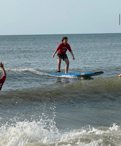 The Nassau County Special Olympics Surf Team surf the waves at in Fernandina Beach. Submitted photo