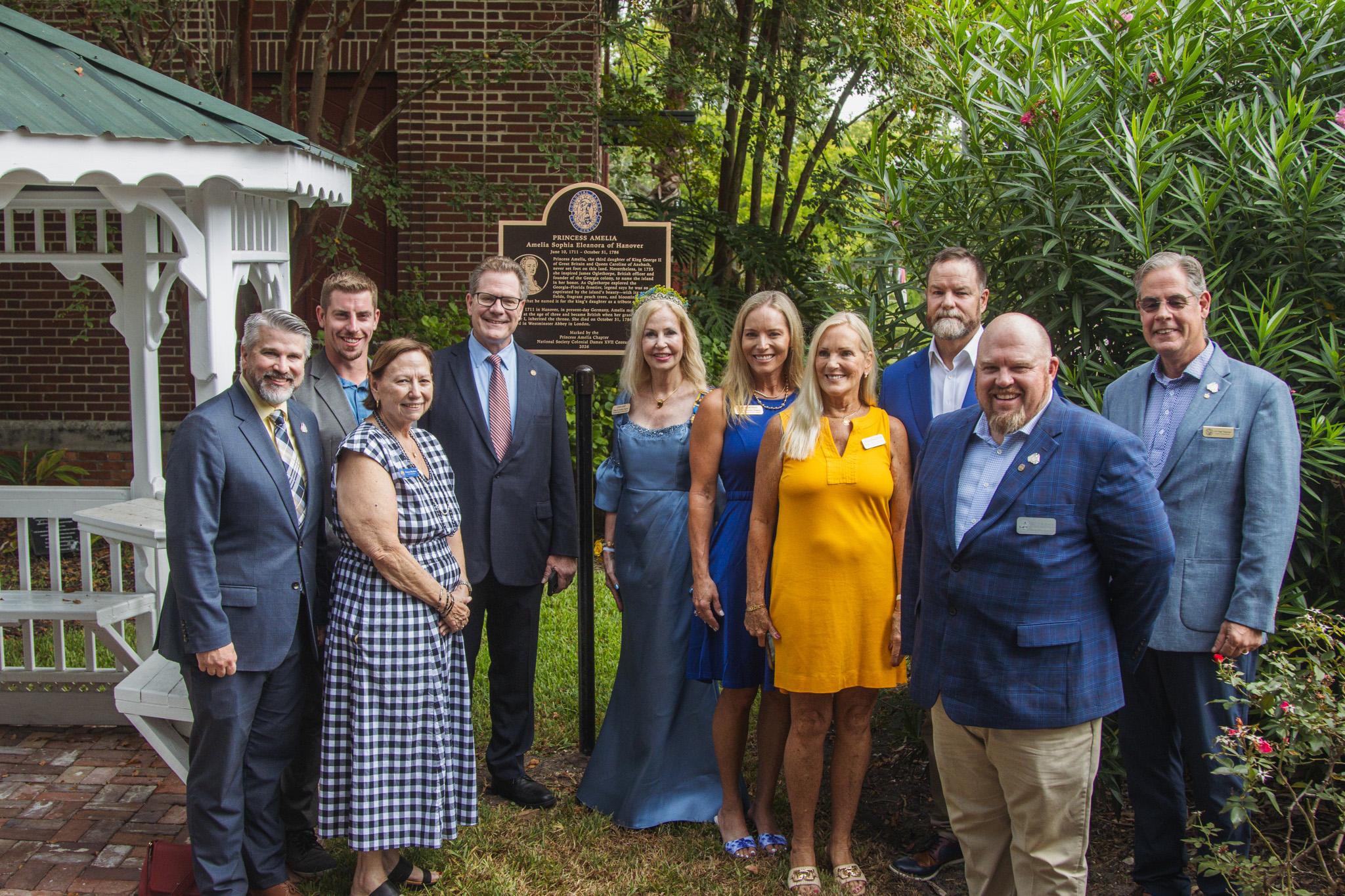  From left, Mitch Keiter, Nassau County Clerk of Circuit Court and Comptroller; Mayor James Antun; City Commissioner Genece Minshew; State Rep. Dean Black; Lynn Leisy, president of the Princess Amelia Chapter of the Florida Society of the Colonial Dames XVII Century; Amy Mizell Green, vice president of the Princess Amelia Chapter; Nassau County School Board member Lissa Braddock ; Congressman Aaron Bean; and Nassau County commissioners Klynt Farmer and A.M. "Hupp" Huppmann. Ashley Chandler/News-Leader