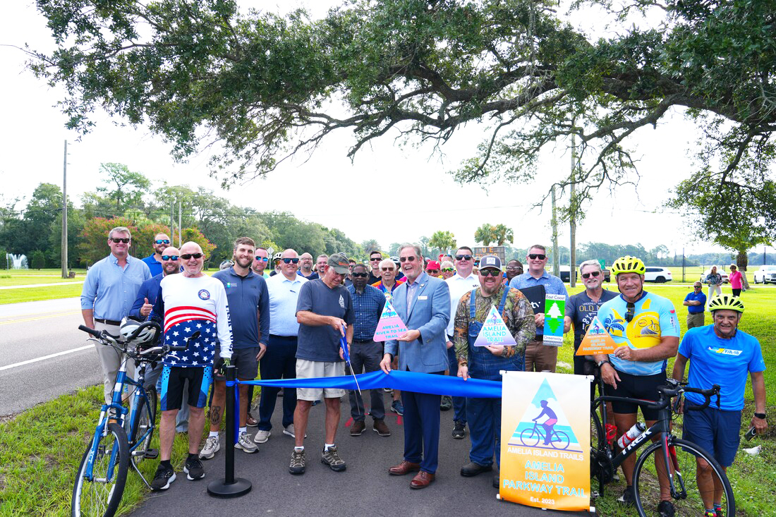 Nassau County leaders and partners participate in the ribbon cutting ceremony for the Amelia Island Parkway Trail on Wednesday along Amelia Island Parkway. Photos courtesy of Nassau County, Fl