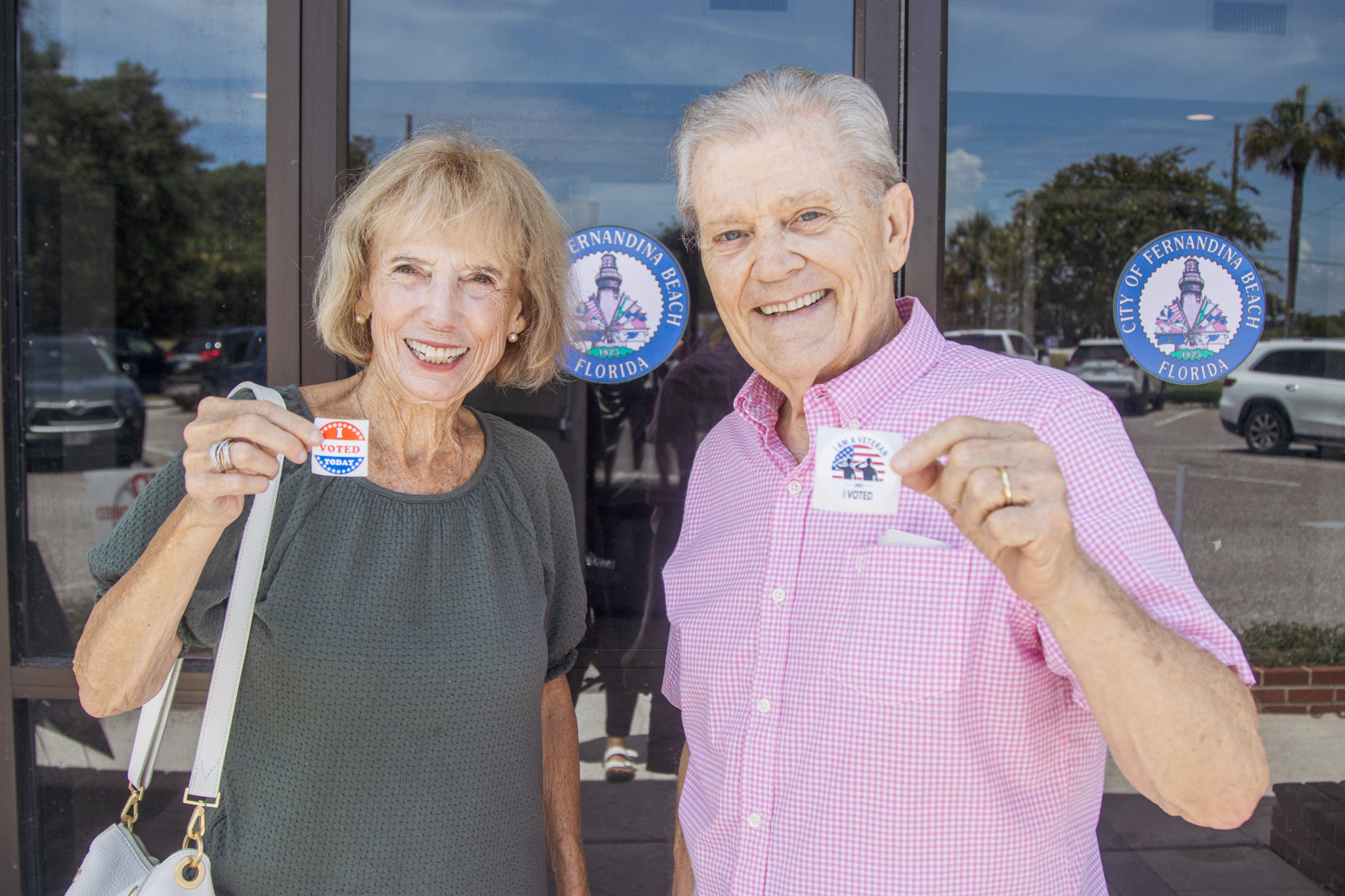 Nassau County residents Helen and James Hylton show off their stickers after turning in their early vote Thursday at the Atlantic Recreation Center in Fernandina Beach. Photo by Ashley Chandler/News-Leader