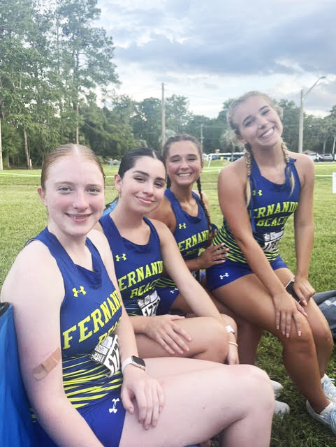 From left, Lady Pirate runners Lexi Hopson, Emma Arratia, Maddie Flick and Carsyn Massey. Photo by Dave Reinhart