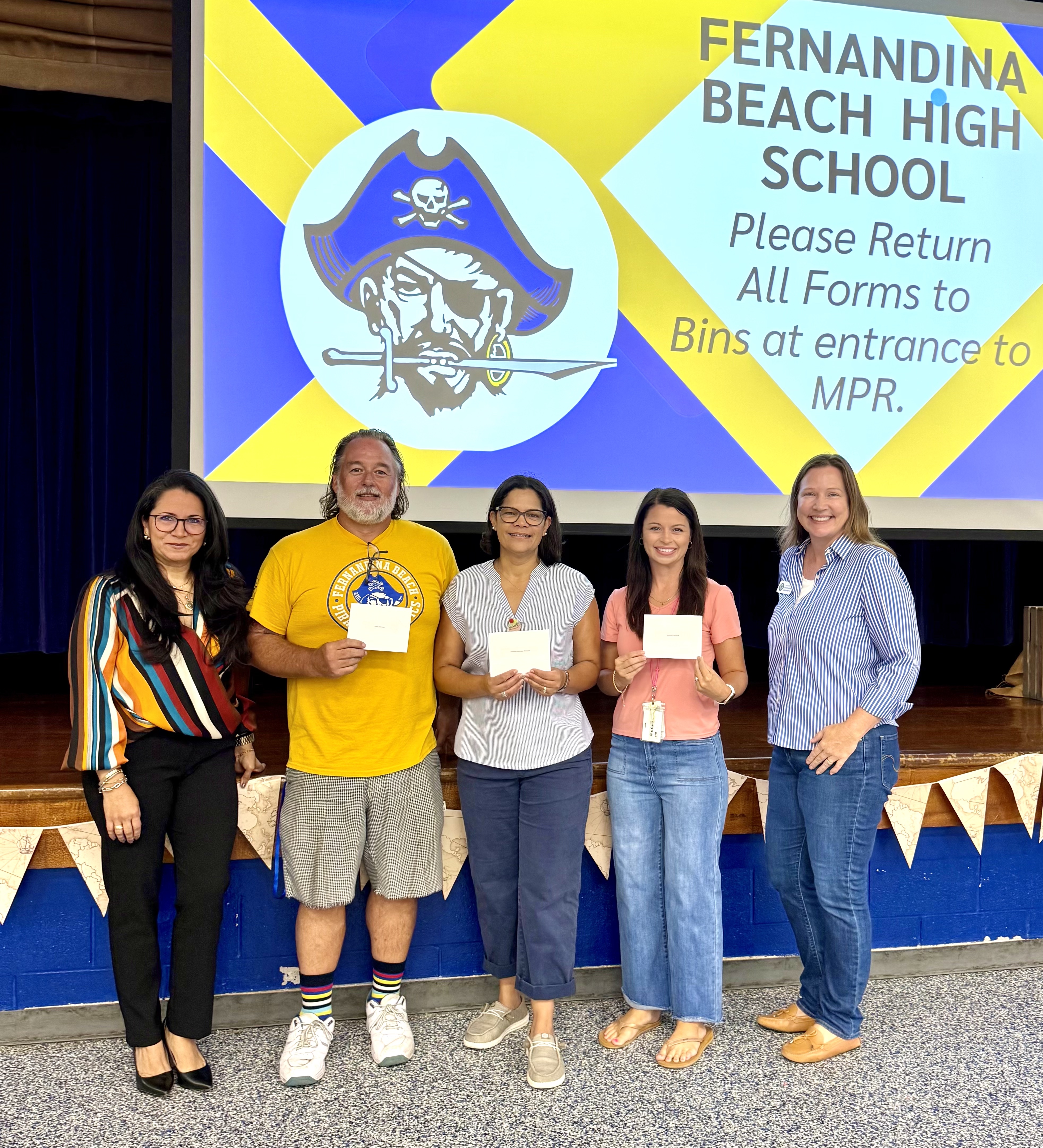 FBHS Foundation members presented school staff with money for school supplies to kick off the school year.