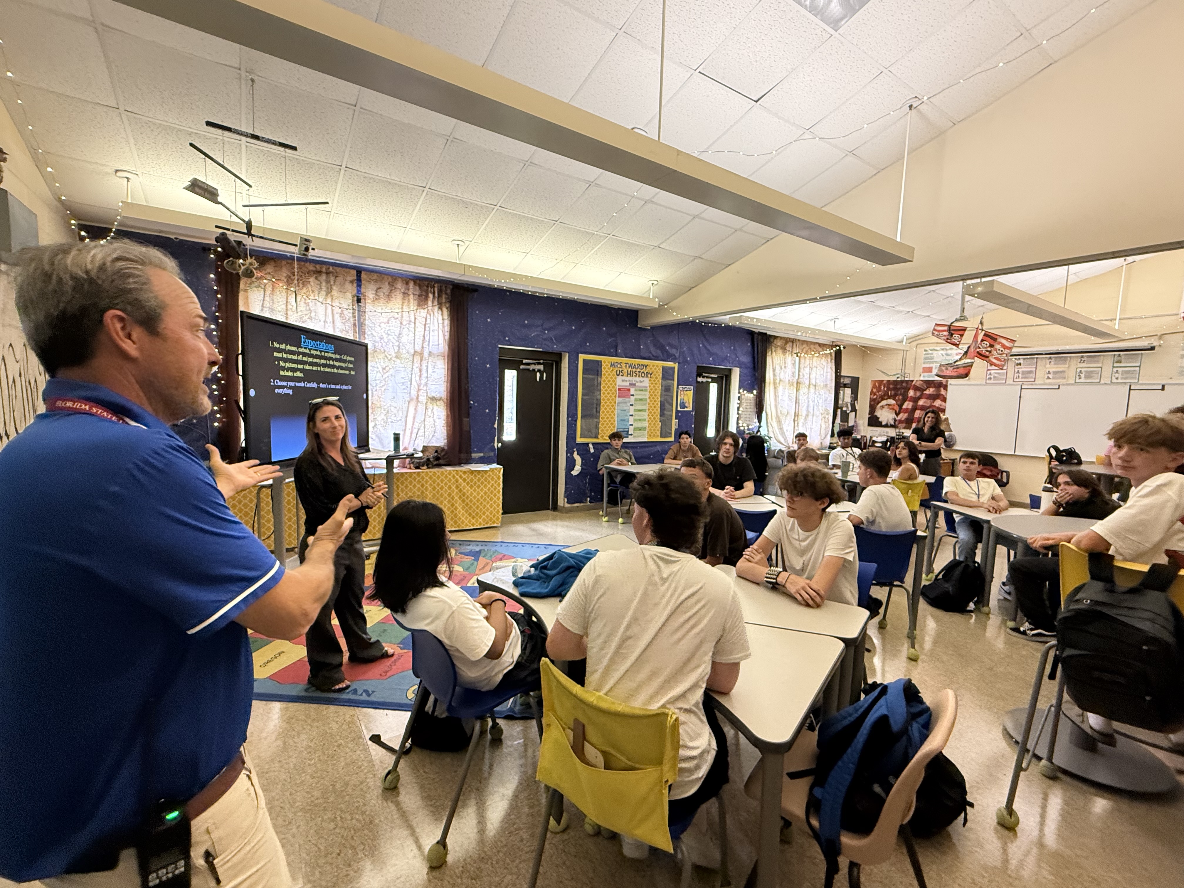 FBHS Principal Chris Webber greets the classroom of Sarah Twardy, the district's Teacher of the Year.