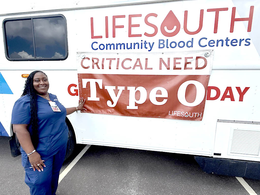 Donor Service Technician Selena Fedd stands outside LifeSouth’s bus in Wildlight on Tuesday. Photo by Nick Blank/News-Leader