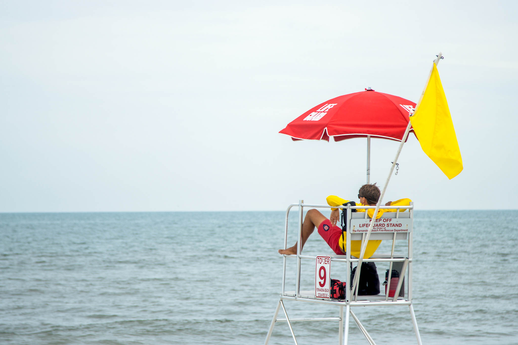  A lifeguard watches over beachgoers in Fernandina Beach. Photo by Ashley Chandler/News-Leader