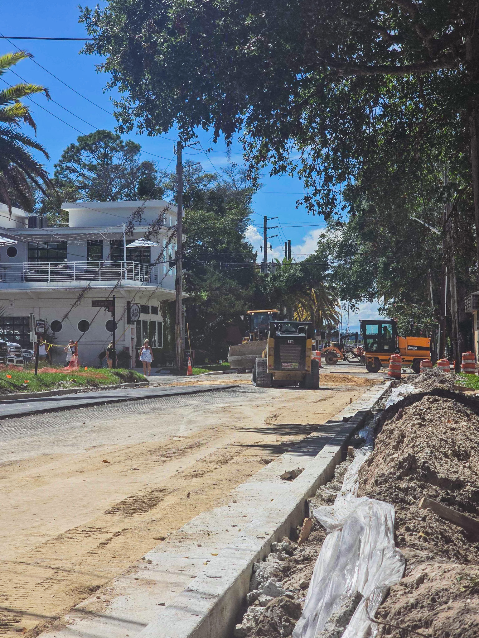 Workers paved portions of Ash Street on Monday. Photo by Ashley Chandler/News-Leader