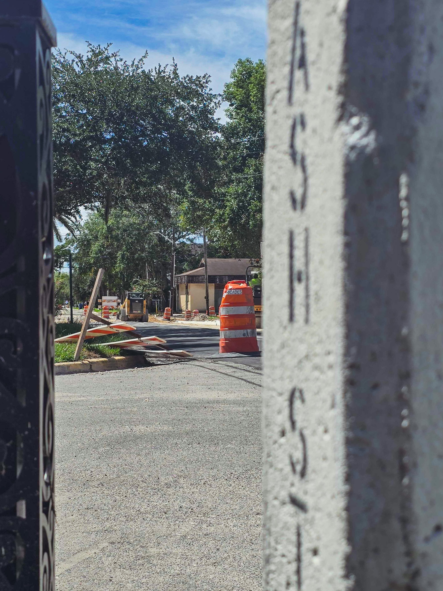 Workers paved portions of Ash Street on Monday. Photo by Ashley Chandler/News-Leader