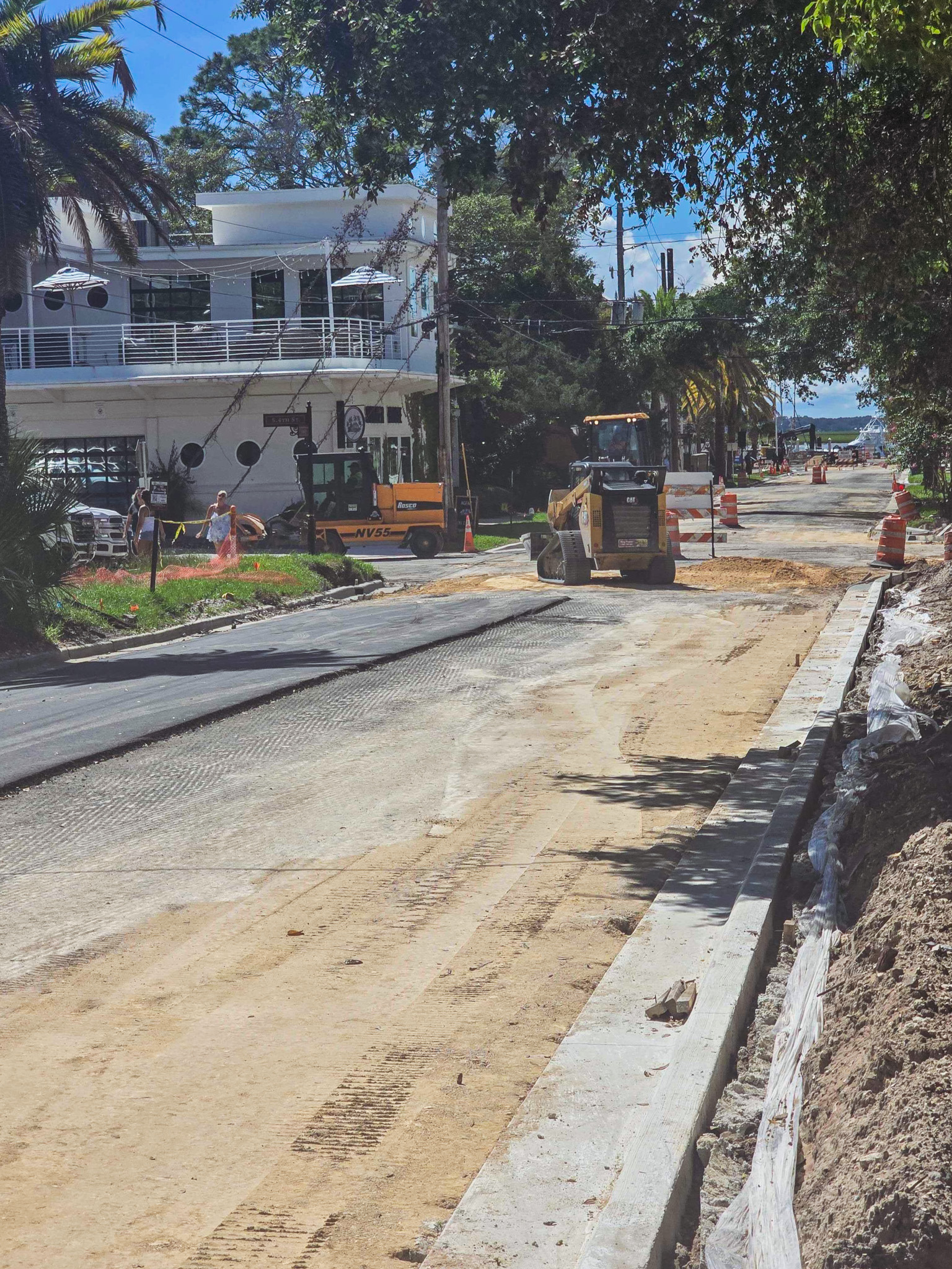 Workers paved portions of Ash Street on Monday. Photo by Ashley Chandler/News-Leader