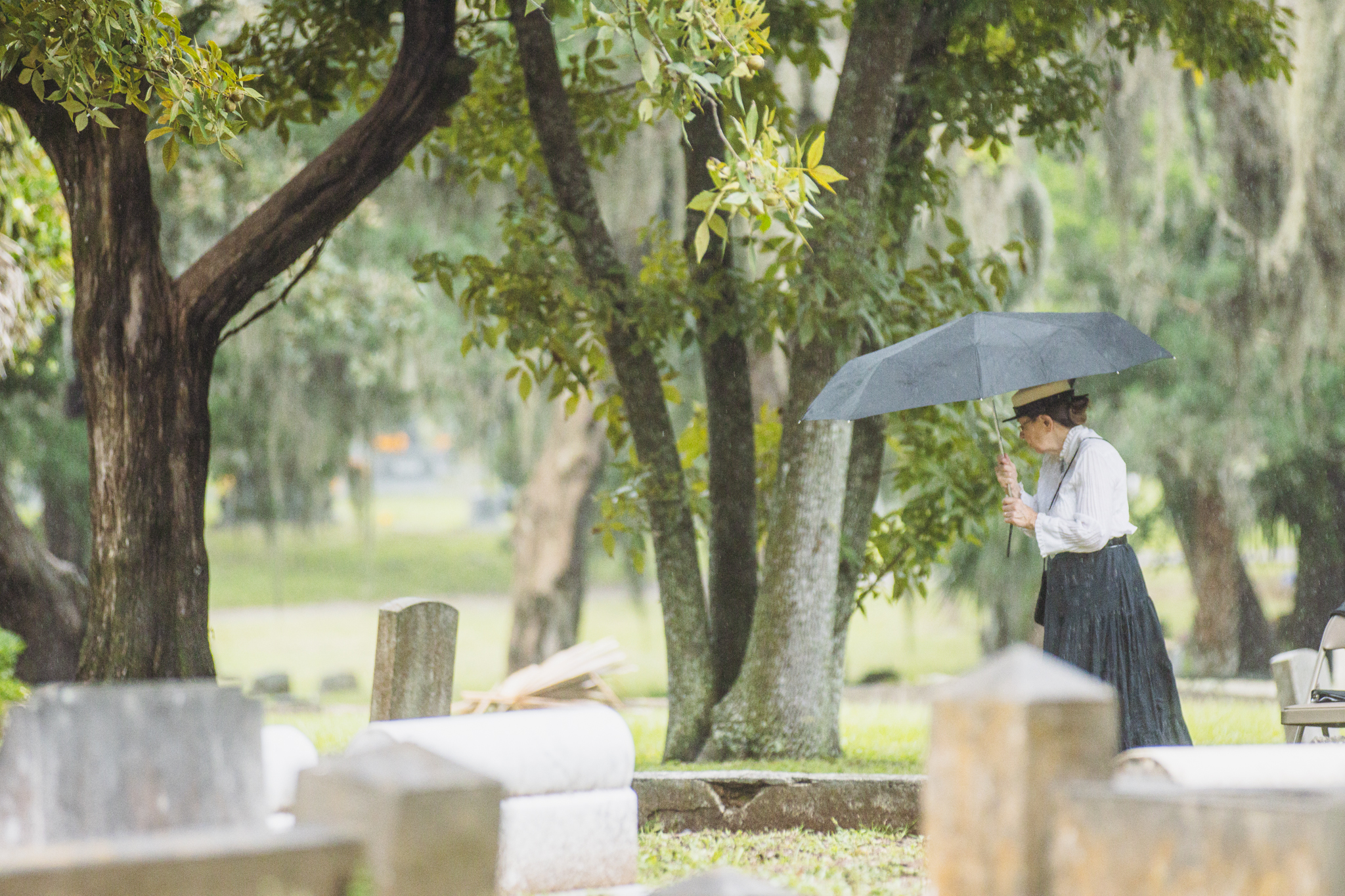 Karen Antworth portrayed Mrs. Alice Padgett Swearingen, wife of former Florida Attorney General and Mayor of Jacksonville, Van Cicero Swearingen, walks nearby the location of Swearingen’s gravesite at Bosque Bello Cemetery. The Amelia Island Museum of History held the Graveside Chronicles: Tales of Life, Love, and Legacy on Saturday at the cemetery. Photo by Ashley Chandler/News-Leader