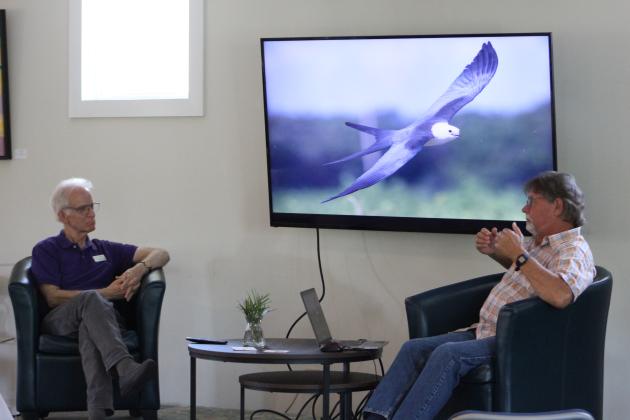 Ken Meyer, right, tells the story of how he got into swallow-tailed kite research, something he’s been doing for more than 30 years now. With Meyer is Story &amp; Song Bookstore Bistro co-owner Mark Kaufman.