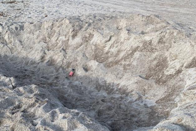 Holes left by resort guests near the Omni Resort were large enough to hold several people. Holes like these cost money to fill and are a danger to both humans and wildlife.
