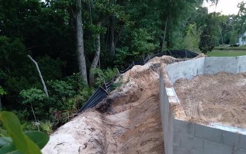 These photos were presented to the Fernandina Beach City Commission by Vice Mayor Len Kreger. They show a construction site in the Amelia Bluff development where requited tree protection was not used, resulting in damage to the trees. Commissioners said they have seen the problem at construction sites throughout the city.