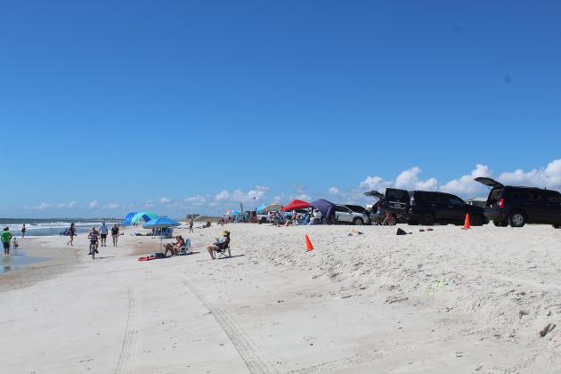 Looking for new sources of revenue, some Fernandina Beach City Commissioners said they would consider charging for people to park on the 600 feet of beach in the city where parking is allowed. Photo by Julia Roberts/News-Leader