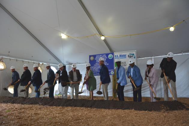 County staff, commissioners and the two state senators joined members of the advisory board.