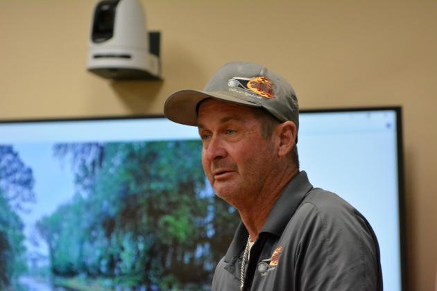 John Ferrell Burkett speaking at a Board of County Commissioners meeting about drainage issues near his property. Photo by Marissa Mahoney/News-Leader.
