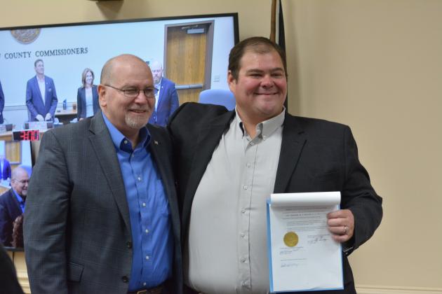 Commissioners Thomas Ford and Aaron Bell accepting resolutions commending their service to Nassau County.  Photos by Marissa Mahoney/News-Leader.