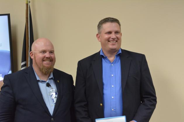 Commissioners Thomas Ford and Aaron Bell accepting resolutions commending their service to Nassau County.  Photos by Marissa Mahoney/News-Leader.