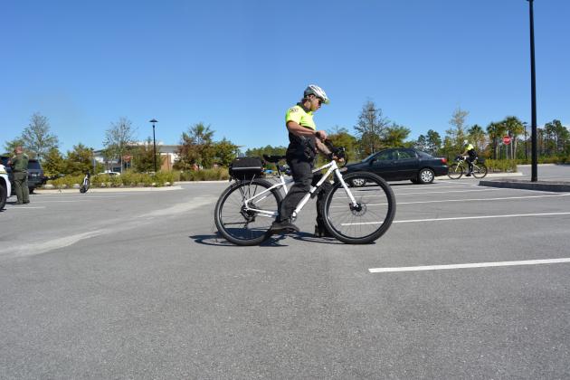 Three NCSO deputies gave a quick demonstration of their newfound bike riding skills during the unveiling. Photos by Marissa Mahoney/News-Leader.