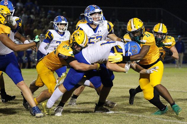 Yulee High School hosted Fernandina Beach Monday night in a makeup matchup. The game was postponed because of Hurricane Ian. Yulee won 21-14. Both teams play on the road Friday. Photos by Beth Jones News-Leader.