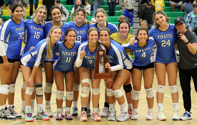The Fernandina Beach High School volleyball team celebrate its second district title in a row Thursday night, beating host Yulee 3-0 in the championship game. The FBHS Lady Pirates advanced to the region playoffs and hosted Beachside High Tuesday in a region quarterfinal match. Photos by Beth Jones/News-Leader.