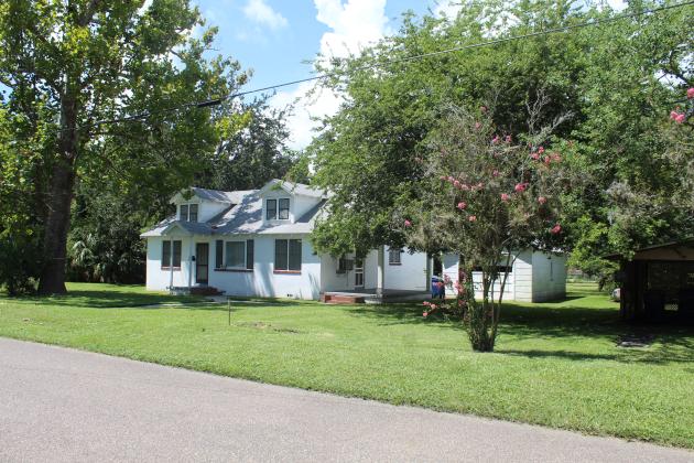 This home on South Fourth Street sits on property that could become the site of a project to build 12 townhomes. The homes on the site, Historic District Chair Mike Spino said, were built by Italian immigrants who helped build the shrimping industry and should be preserved. People living in the neighborhood are opposing the project.
