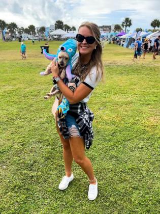 Brittany Rock and her pup Brady placed in the Tails for Whales doggy parade Sunday morning.