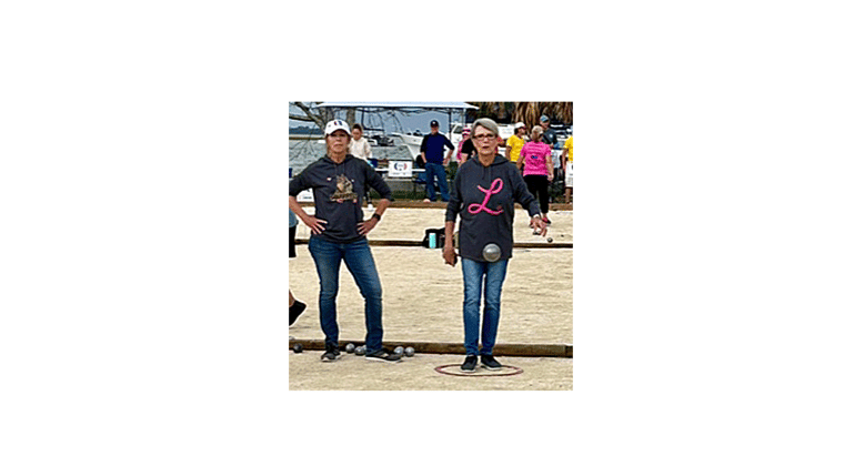 Club members Lee Ann Shobe on the left and her partner Lindsey Underwood throwing the boule in the Ladies’ Tournament.