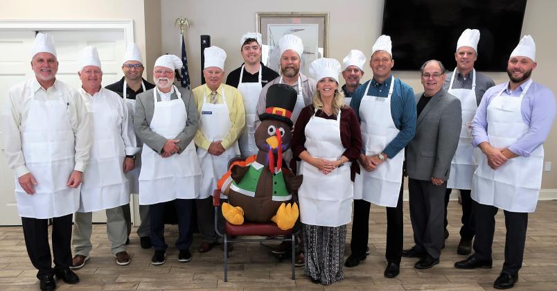 This year’s celebrity chefs had a big job serving a complete Thanksgiving meal (plus pie!) to local seniors. Left to right: Ed Hubel, Hospital President, Baptist Medical Center Nassau; Greg Cook, General Manager, The Ritz-Carlton, Amelia Island; Mark Homans, General Manager, Performance Fibers/Rayonier Advanced Materials Fernandina Plant; Foy Maloy, Publisher, News-Leader and Nassau County Record; Dale Martin, City Manager, Fernandina Beach; Bradley Bean, Mayor-elect, Fernandina Beach; Aaron Bean, U.S. Repr