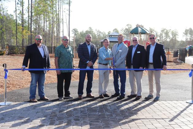 From left is Commissioner Klynt Farmer; Joel Dantzler, President and Owner of the Dantzler Group; County Manager, Taco Pope; Greg Matovina, President of Matovina & Company; Chairman Jeff Gray; Commissioner John Martin; and Commissioner Elect, Hupp Huppman.
