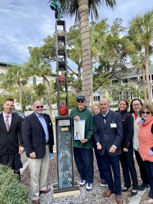Pictured are, from left, Jarred Bishop, County Commissioner John Martin, Fernandina Beach Mayor Mike Lednovich, Marsha Joyner, Richard Restiano, Parks Director Catherine Vorrasi, Fran Shea and Ann Freeman.