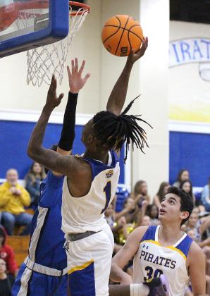 The Fernandina Beach High School boys basketball team hosted the Stanton Blue Devils Friday night in the Pirates’ season opener. Photos by Beth Jones.
