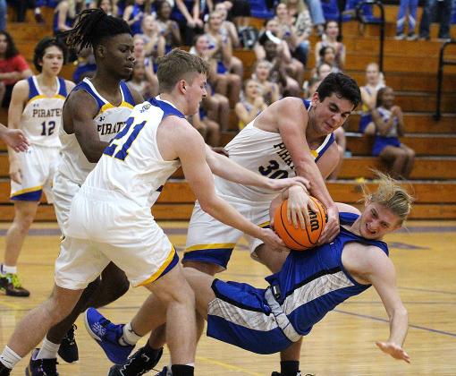 The Fernandina Beach High School boys basketball team hosted the Stanton Blue Devils Friday night in the Pirates’ season opener. Photos by Beth Jones.