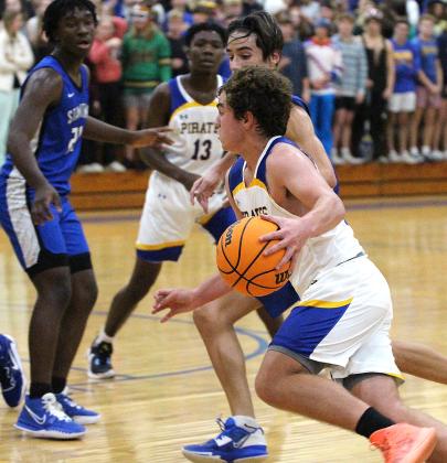 The Fernandina Beach High School boys basketball team hosted the Stanton Blue Devils Friday night in the Pirates’ season opener. Photos by Beth Jones.