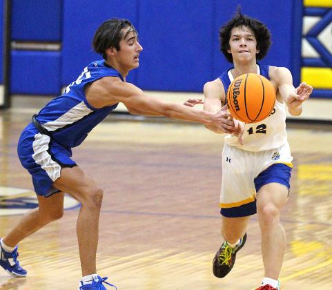 The Fernandina Beach High School boys basketball team hosted the Stanton Blue Devils Friday night in the Pirates’ season opener. Photos by Beth Jones.