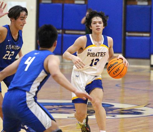 The Fernandina Beach High School boys basketball team hosted the Stanton Blue Devils Friday night in the Pirates’ season opener. Photos by Beth Jones.