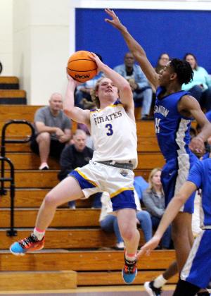 The Fernandina Beach High School boys basketball team hosted the Stanton Blue Devils Friday night in the Pirates’ season opener. Photos by Beth Jones.