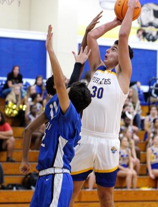 The Fernandina Beach High School boys basketball team hosted the Stanton Blue Devils Friday night in the Pirates’ season opener. Photos by Beth Jones.