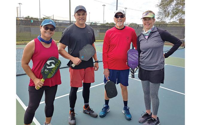 First-place winners Allen Davis and Deb Kienle with second-place winners Susan Foxworth and Monty Hamilton, from left. Submitted photo.