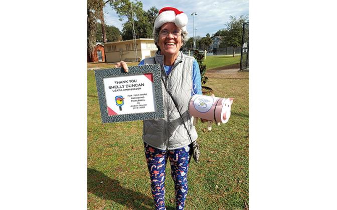 Shelly Duncan, USAPA Ambassador for Amelia Island, receiving recognition for her volunteer service from 2019-22 to the Fernandina Beach Pickleball Pirates and to the city of Fernandina Beach. Submitted photo.
