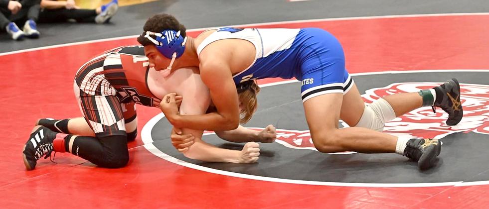 FBHS wrestlers in action over the weekend include, clockwise from top left, Enzo Gamba, Cael Kubatzke, Elijah Smith, Gauge Housely and Nik Saldana.